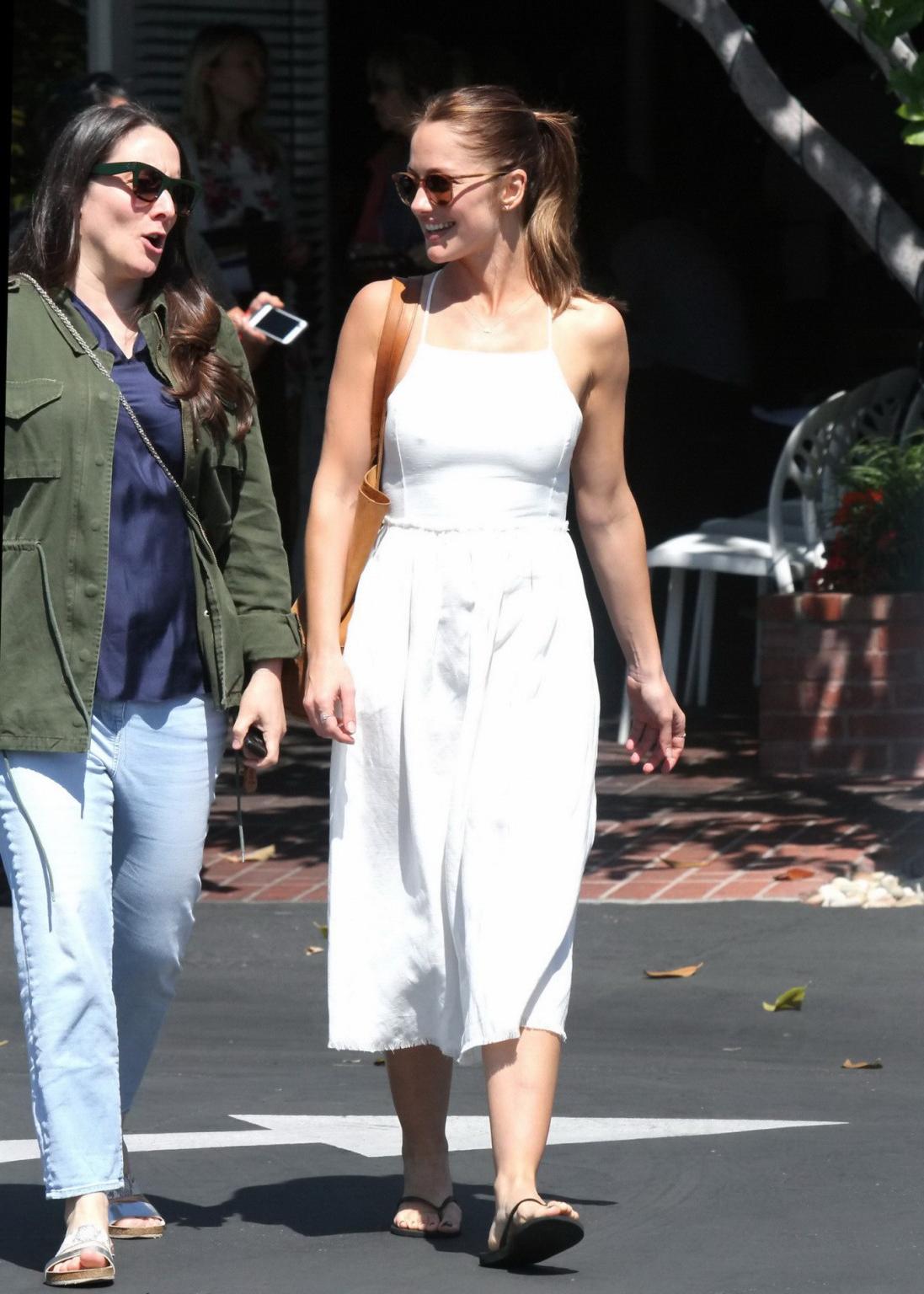 16P Minka Kelly showing nipple pokies in a sexy white dress