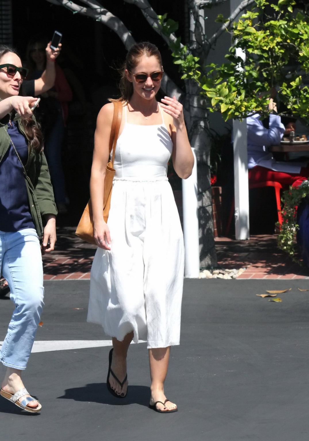 16P Minka Kelly showing nipple pokies in a sexy white dress
