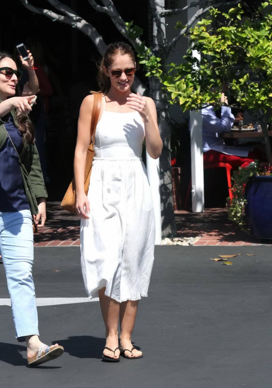 16P Minka Kelly showing nipple pokies in a sexy white dress