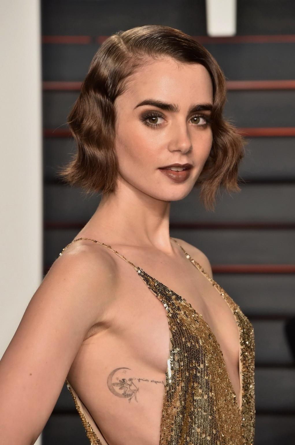 16P Lily Collins showing sideboob huge cleavage and legs