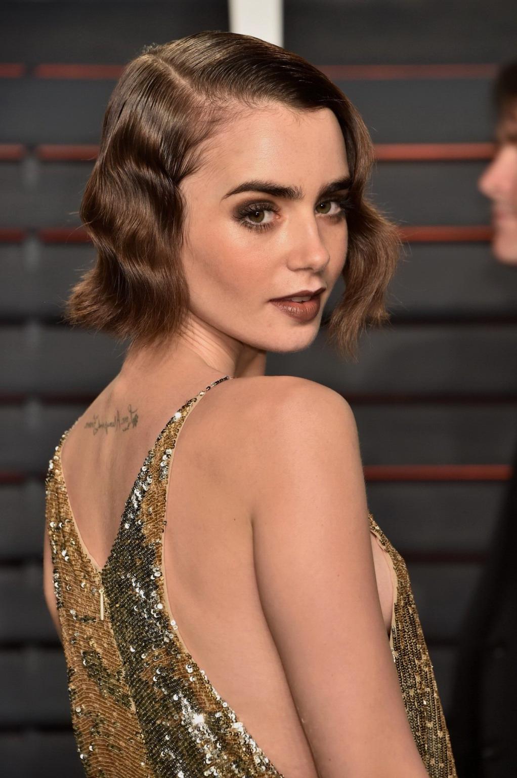 16P Lily Collins showing sideboob huge cleavage and legs