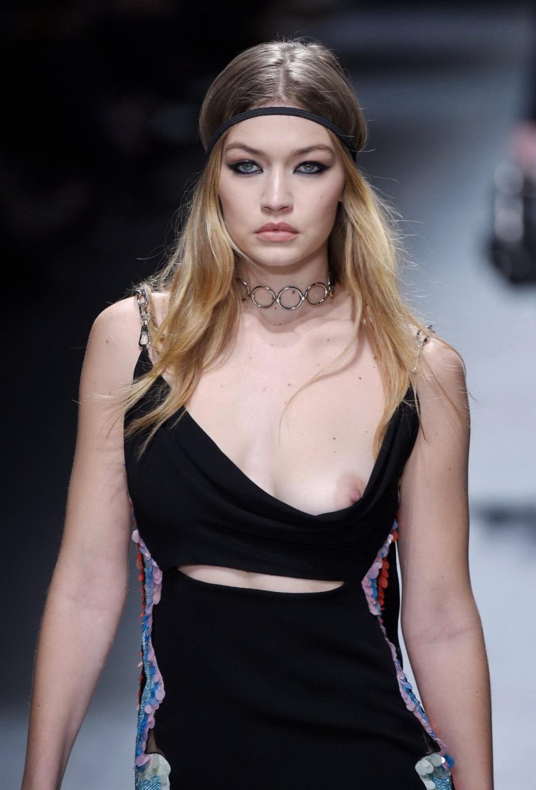 16P Gigi Hadid boob slip at the fashion show