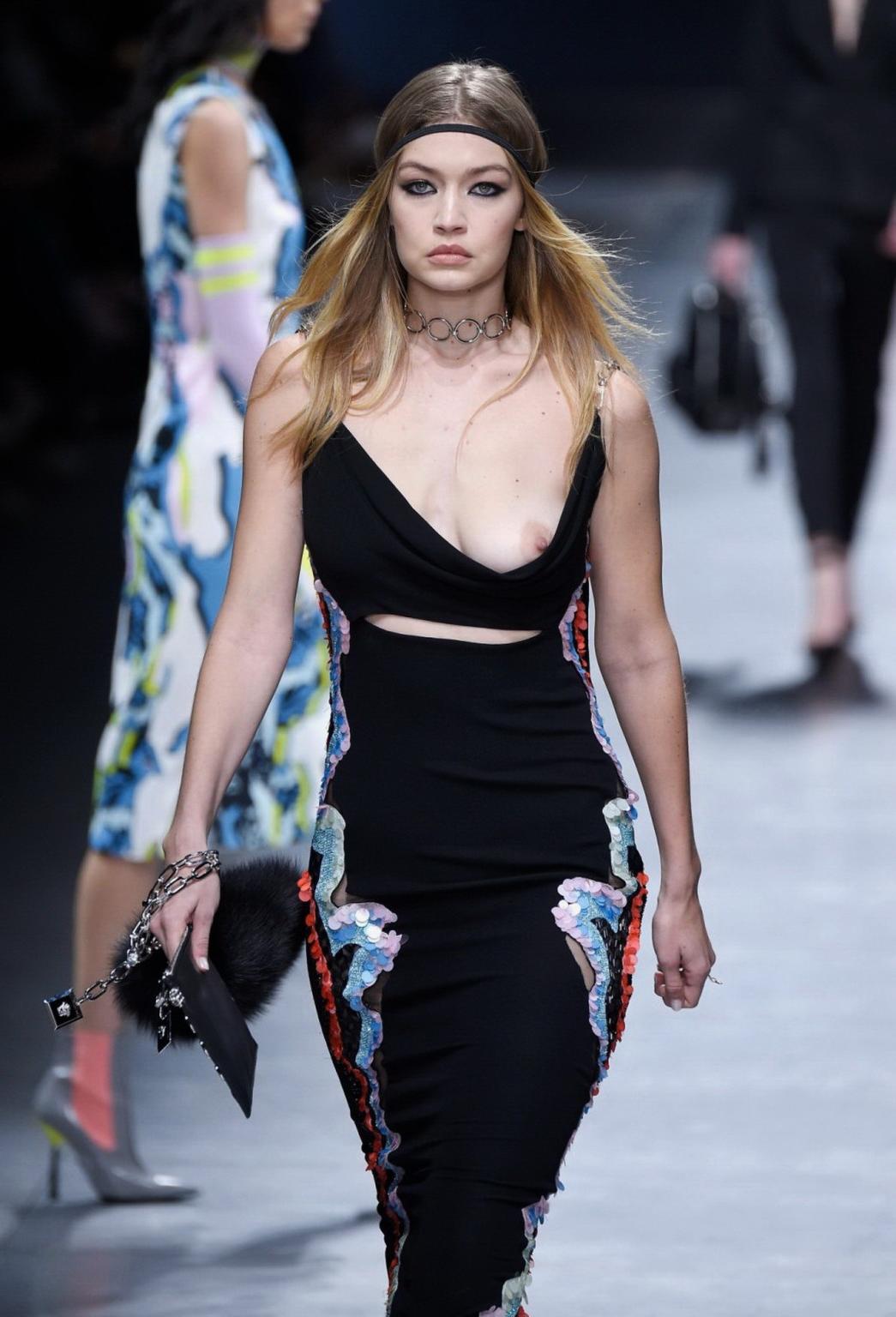 16P Gigi Hadid boob slip at the fashion show