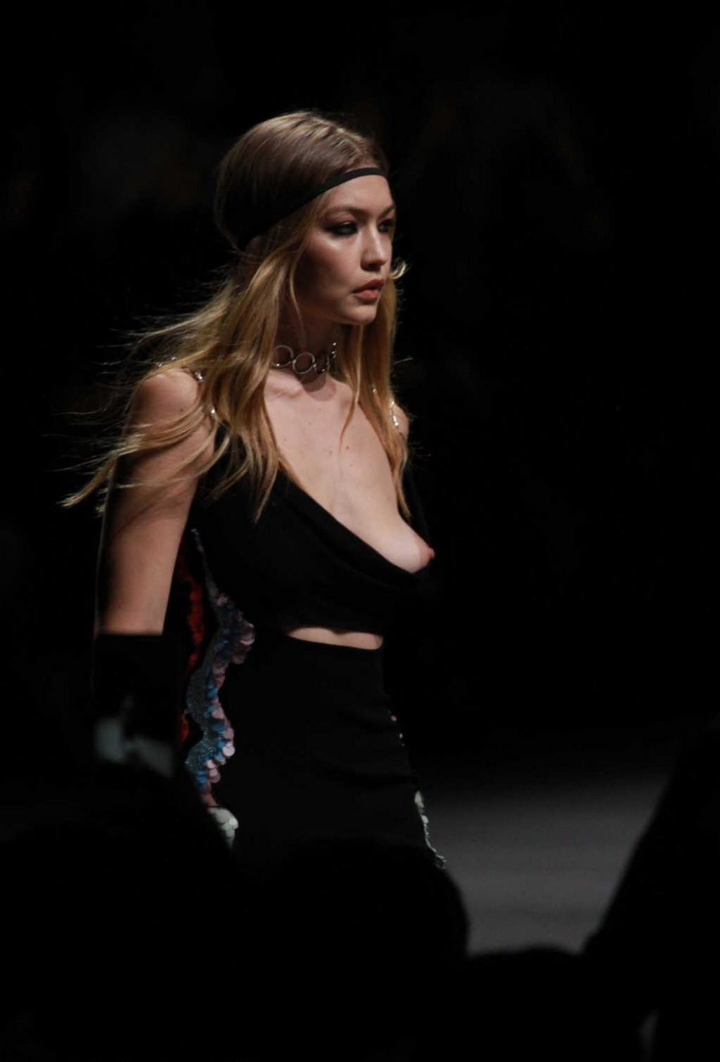 16P Gigi Hadid boob slip at the fashion show
