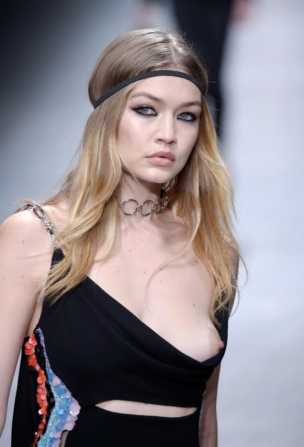 16P Gigi Hadid boob slip at the fashion show