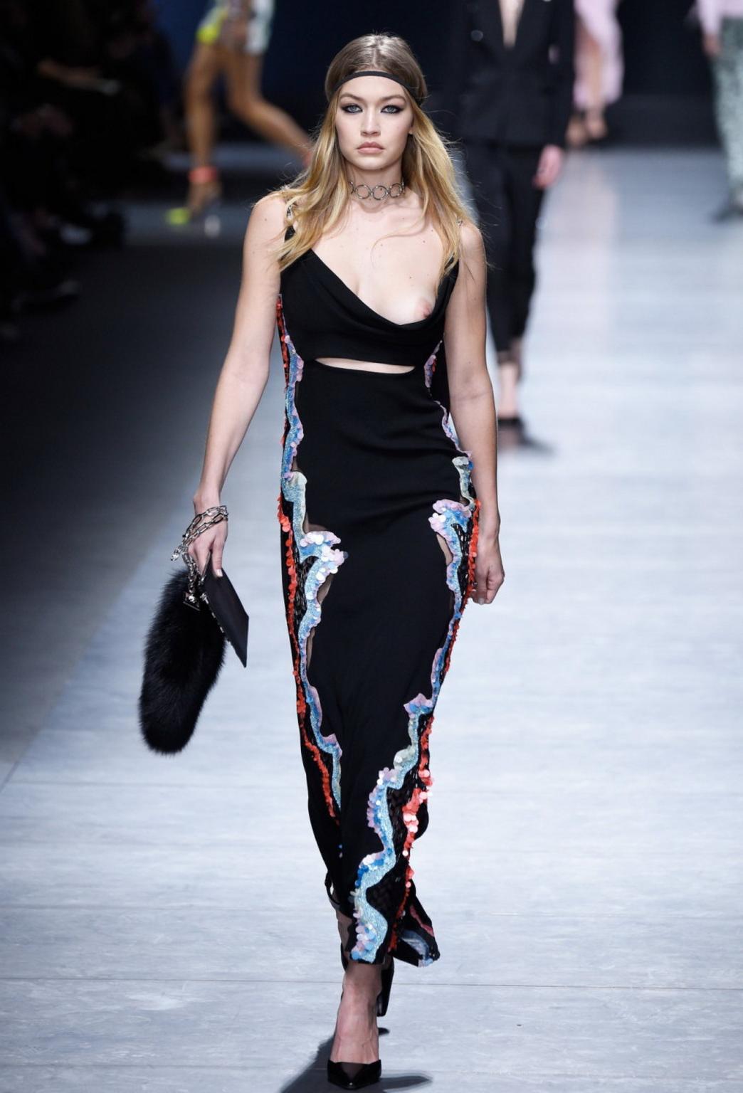 16P Gigi Hadid boob slip at the fashion show