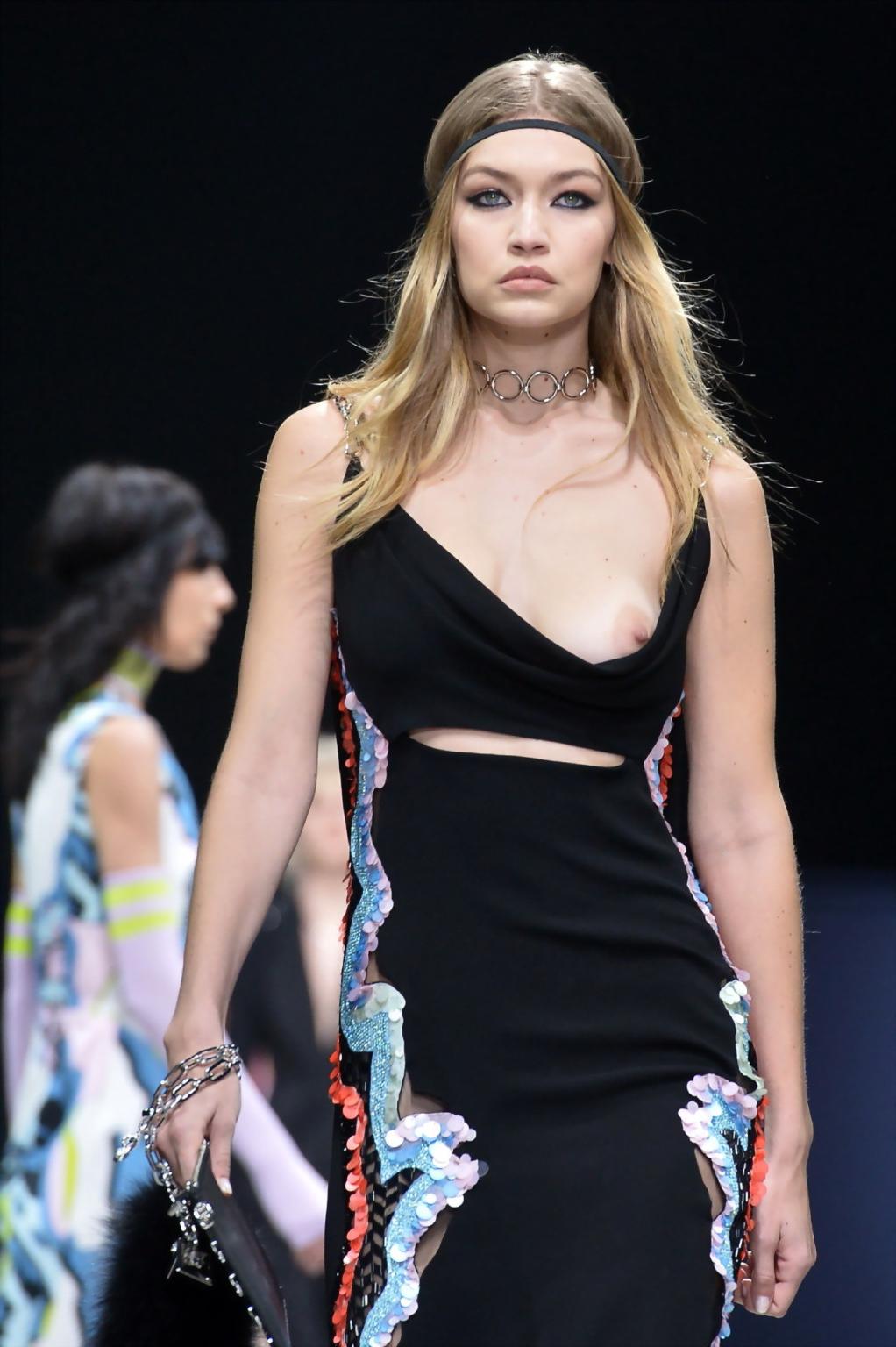16P Gigi Hadid boob slip at the fashion show