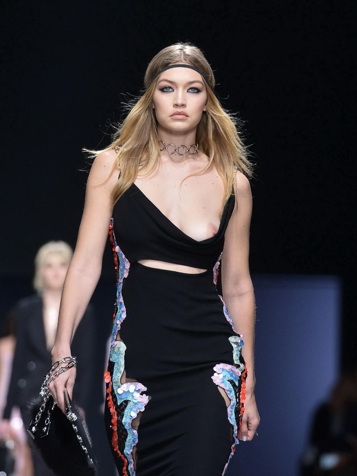 16P Gigi Hadid boob slip at the fashion show