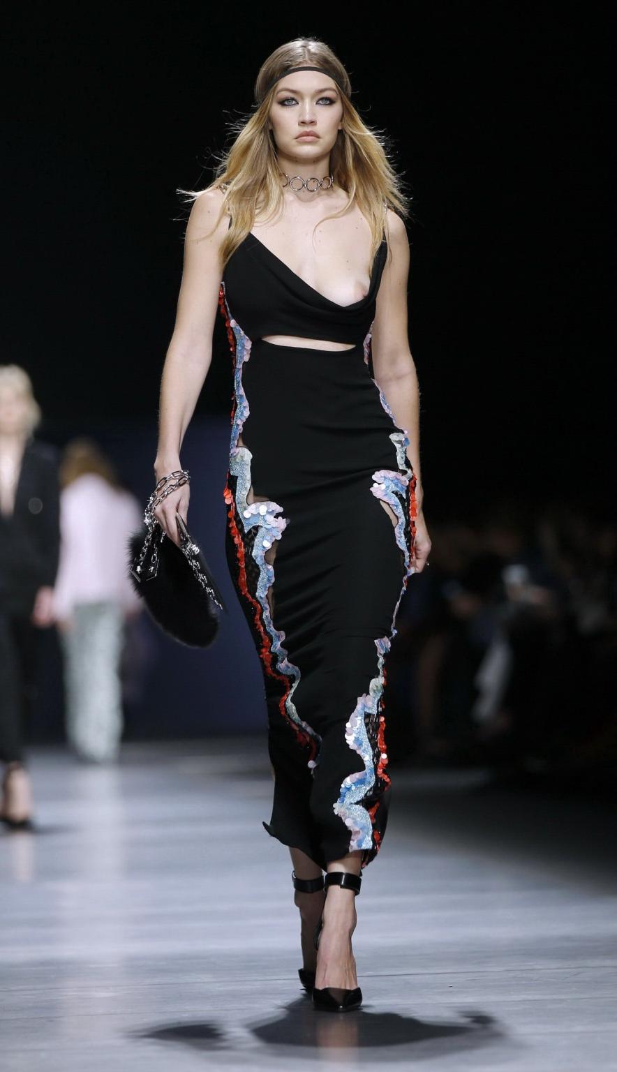 16P Gigi Hadid boob slip at the fashion show