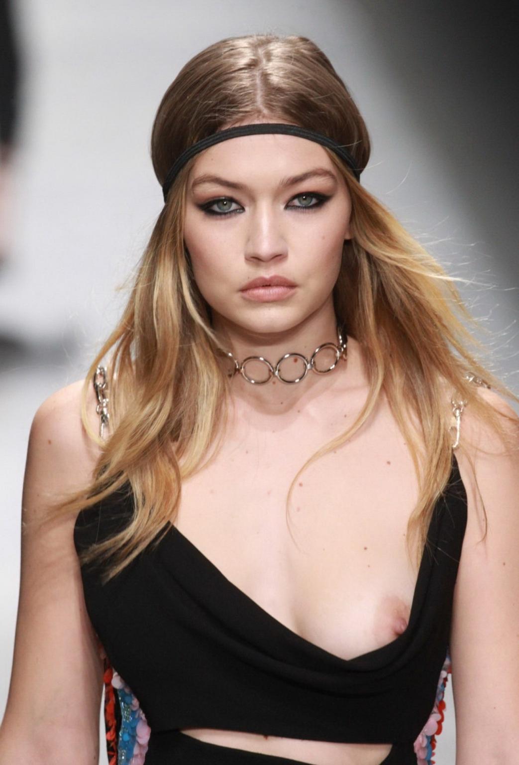 16P Gigi Hadid boob slip at the fashion show