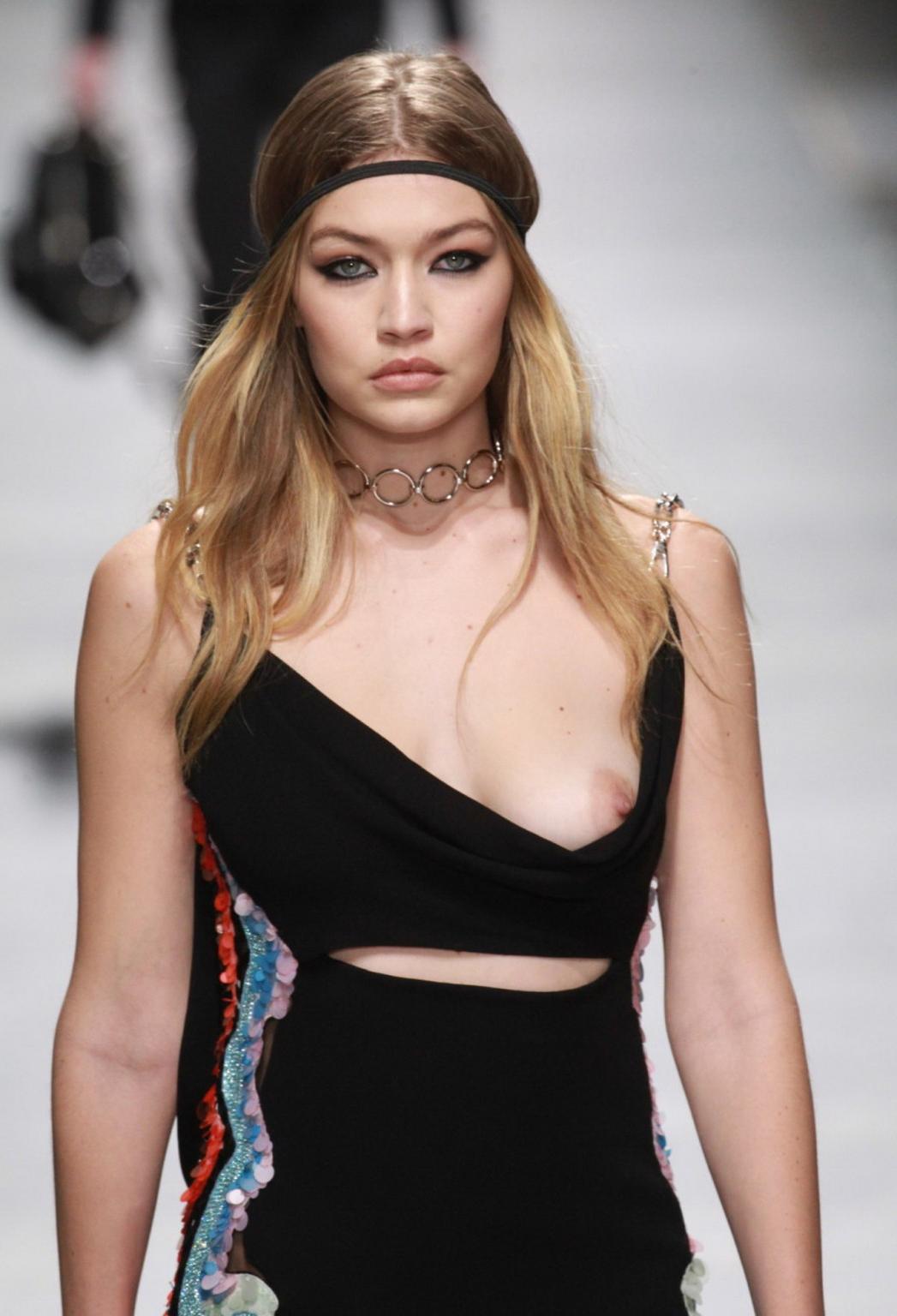 16P Gigi Hadid boob slip at the fashion show