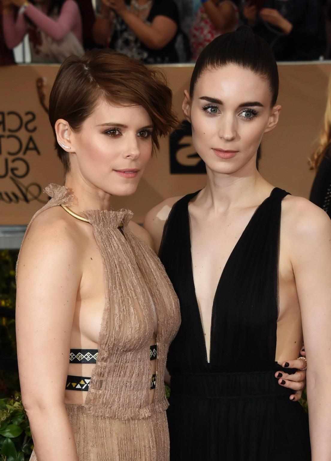 16P Kate Mara busty showing sideboob and big cleavage