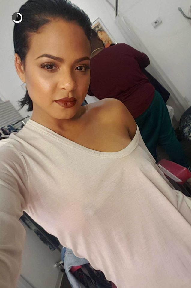 16P Christina Milian flashes white underwear