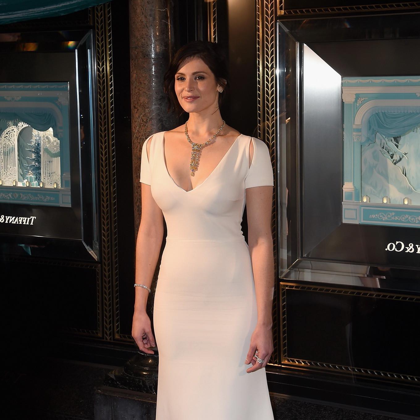 16P Gemma Arterton showing big cleavage in tight white dress