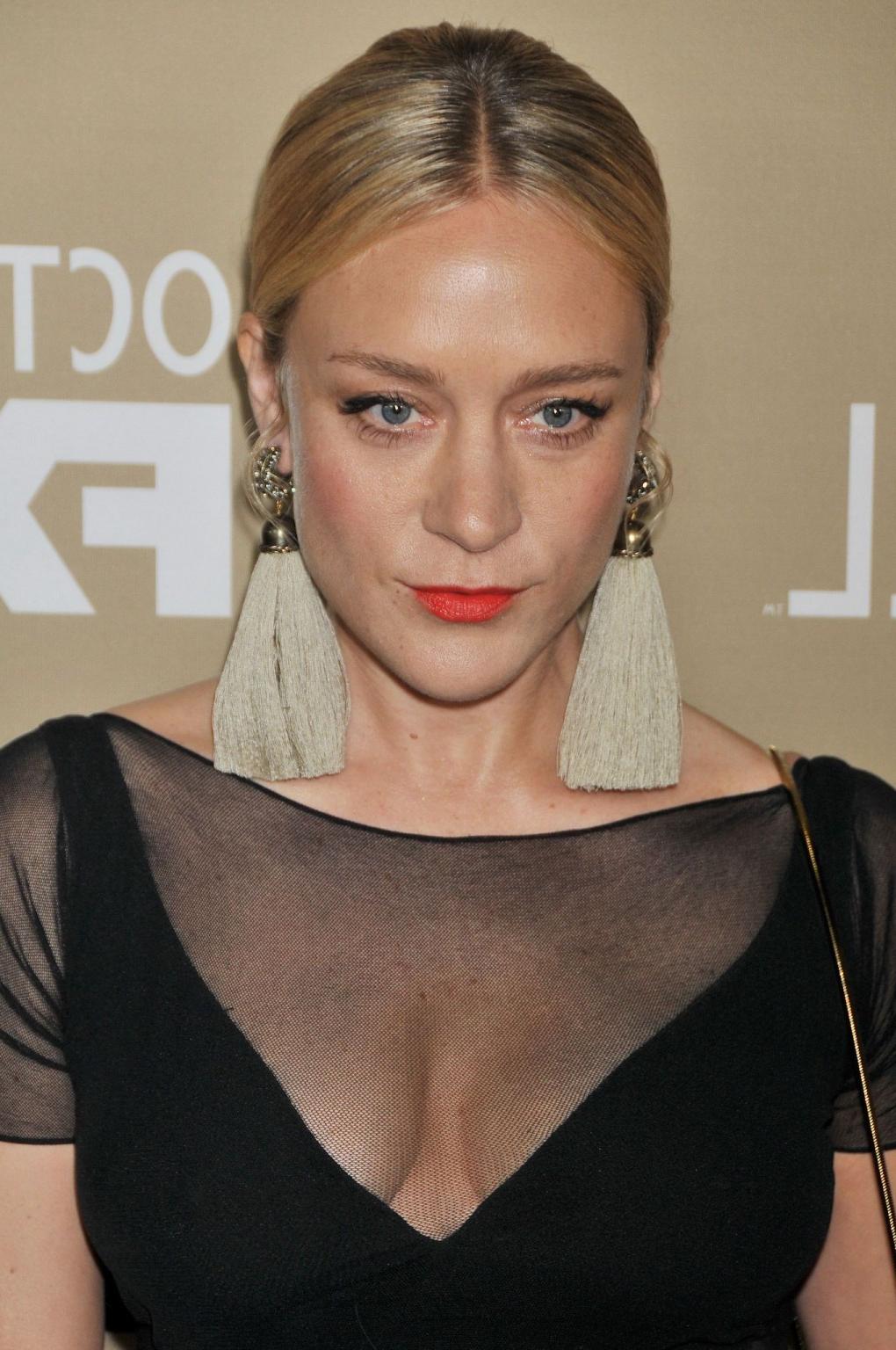 16P Chloe Sevigny busty and leggy showing big cleavage