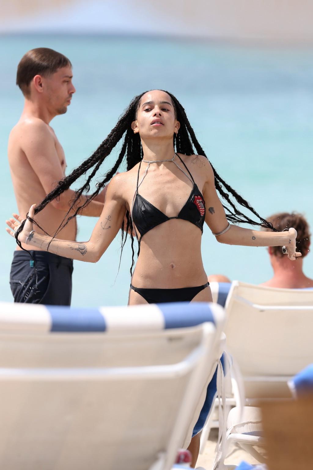16P Zoe Kravitz showing nipple pokies in tiny black bikini