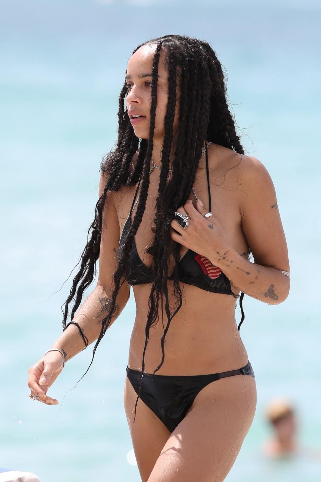 16P Zoe Kravitz showing nipple pokies in tiny black bikini