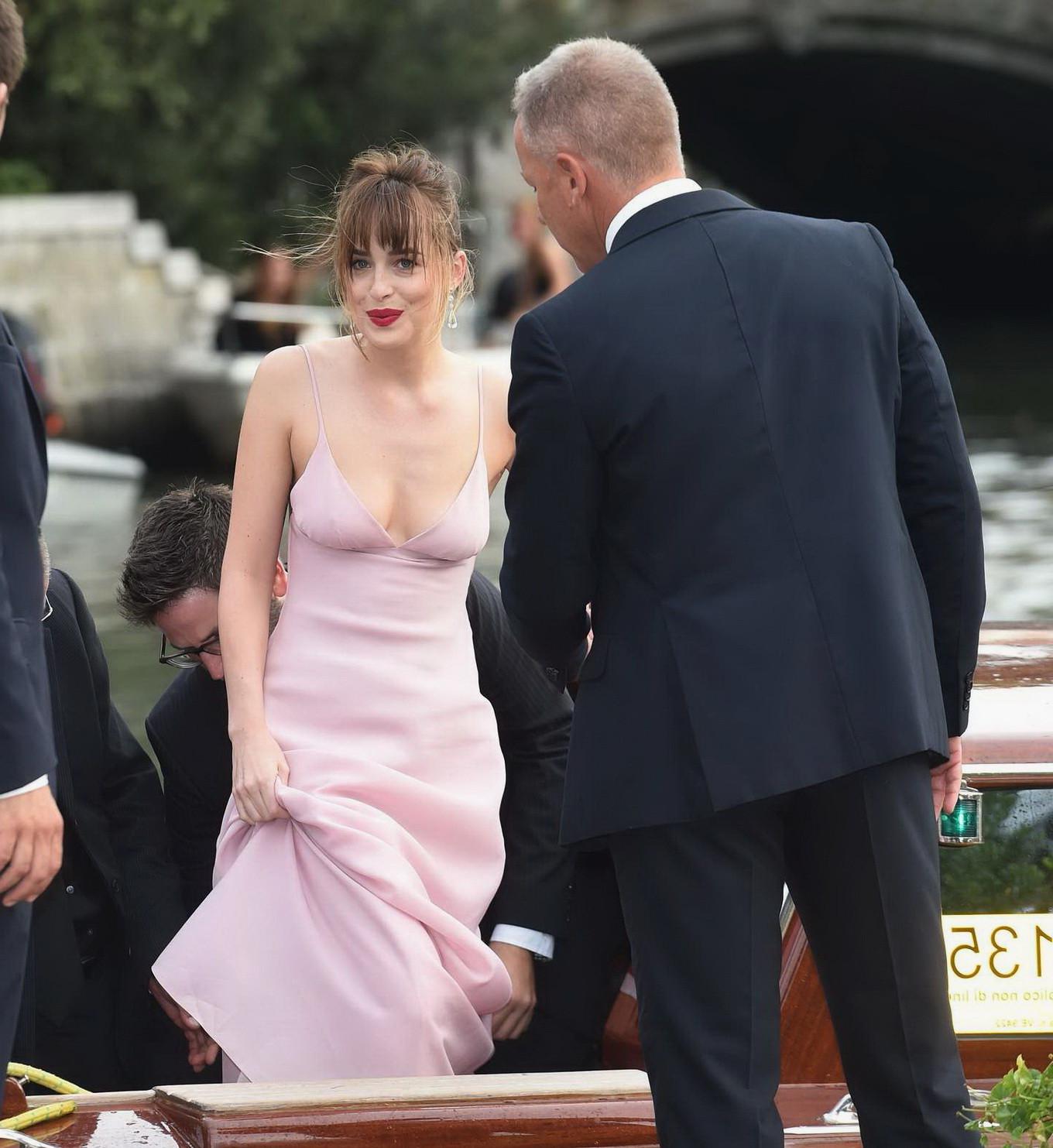 16P Dakota Johnson showing nipple pokies and huge cleavage