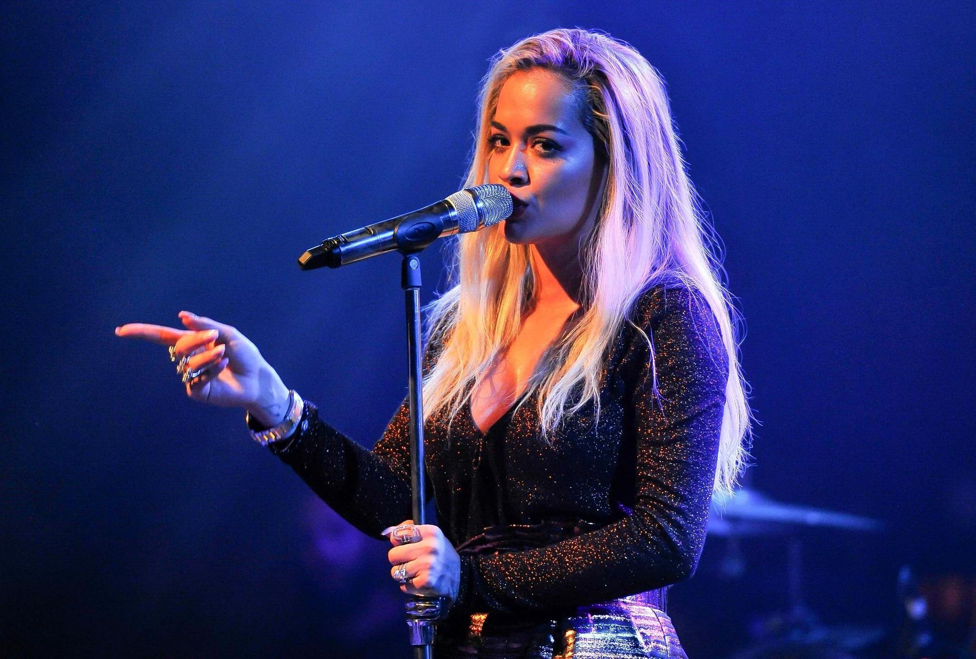 16P Rita Ora shows huge cleavage while performing