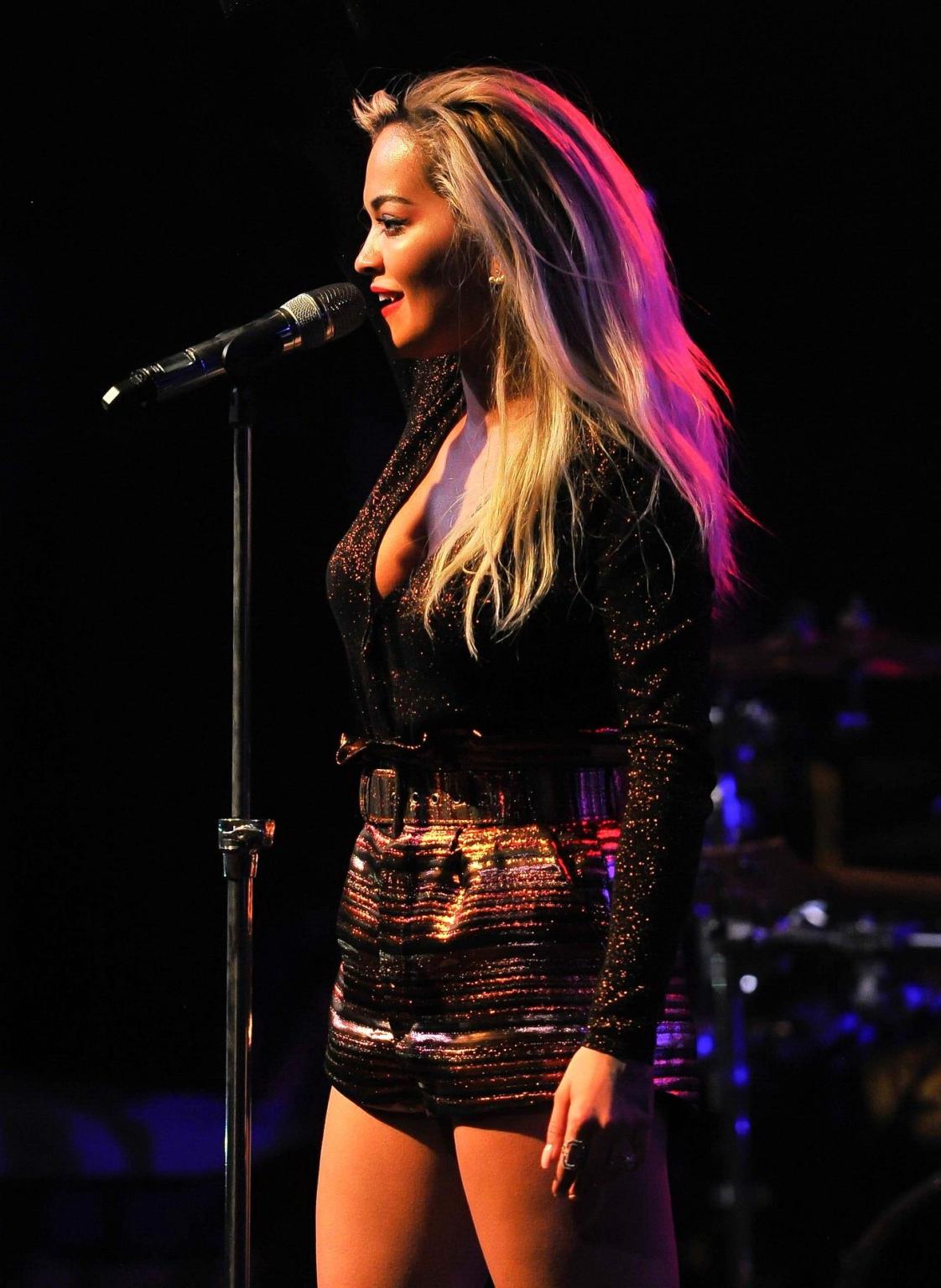 16P Rita Ora shows huge cleavage while performing