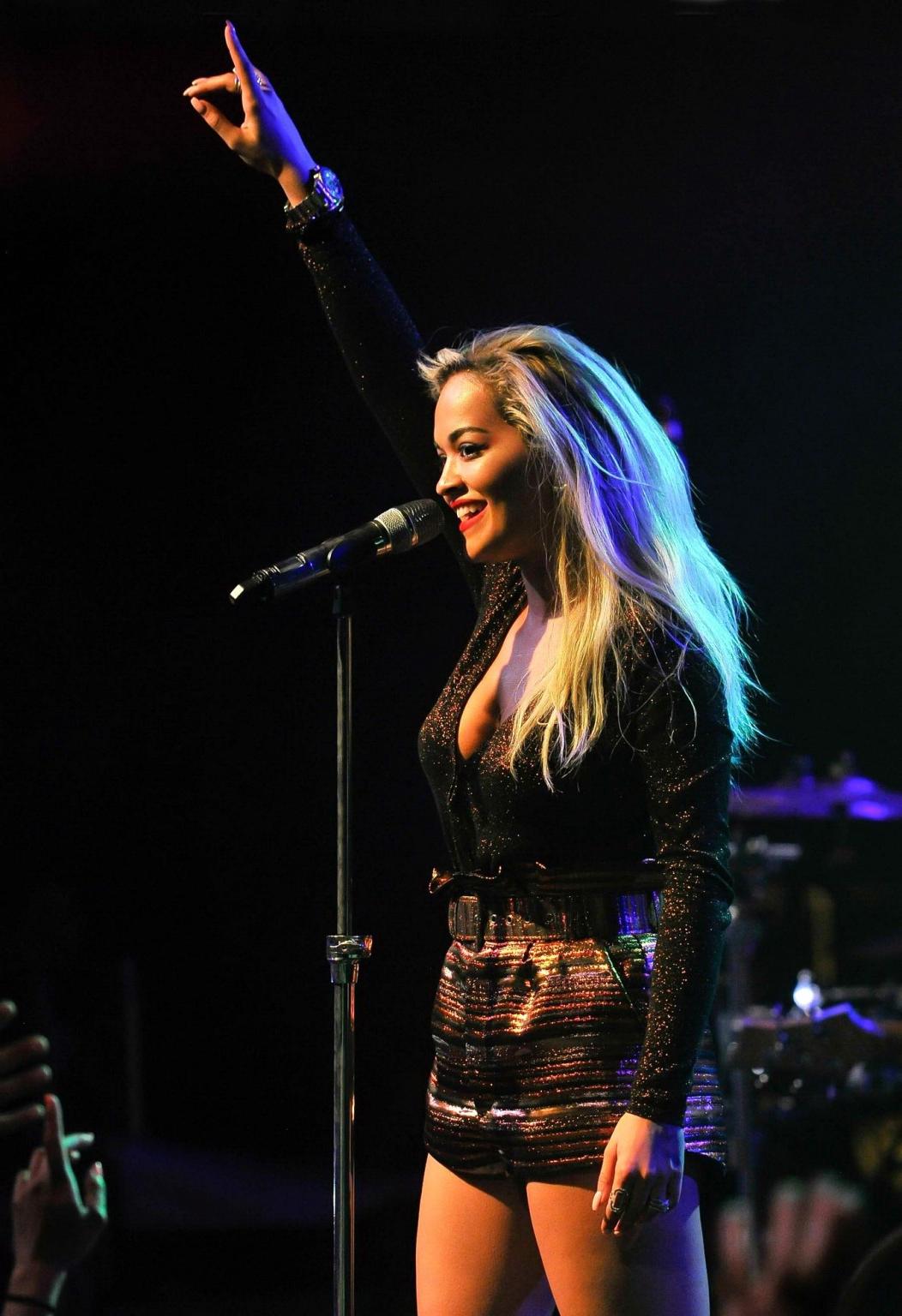16P Rita Ora shows huge cleavage while performing