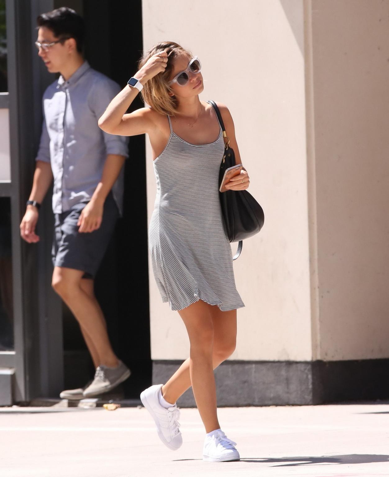 14P Sarah Hyland braless showing nipple pokies outdoor