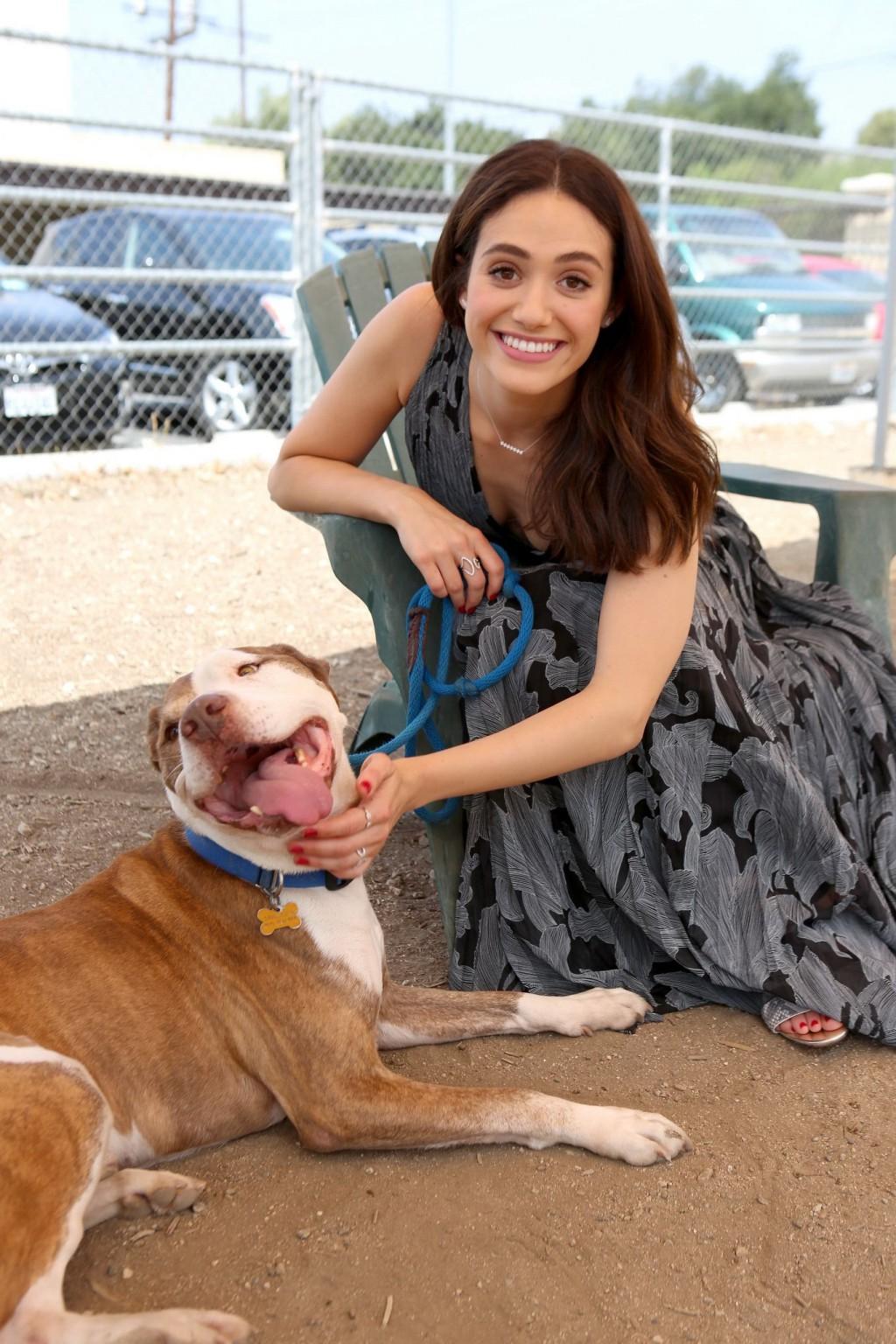 16P Emmy Rossum braless showing big cleavage in LA