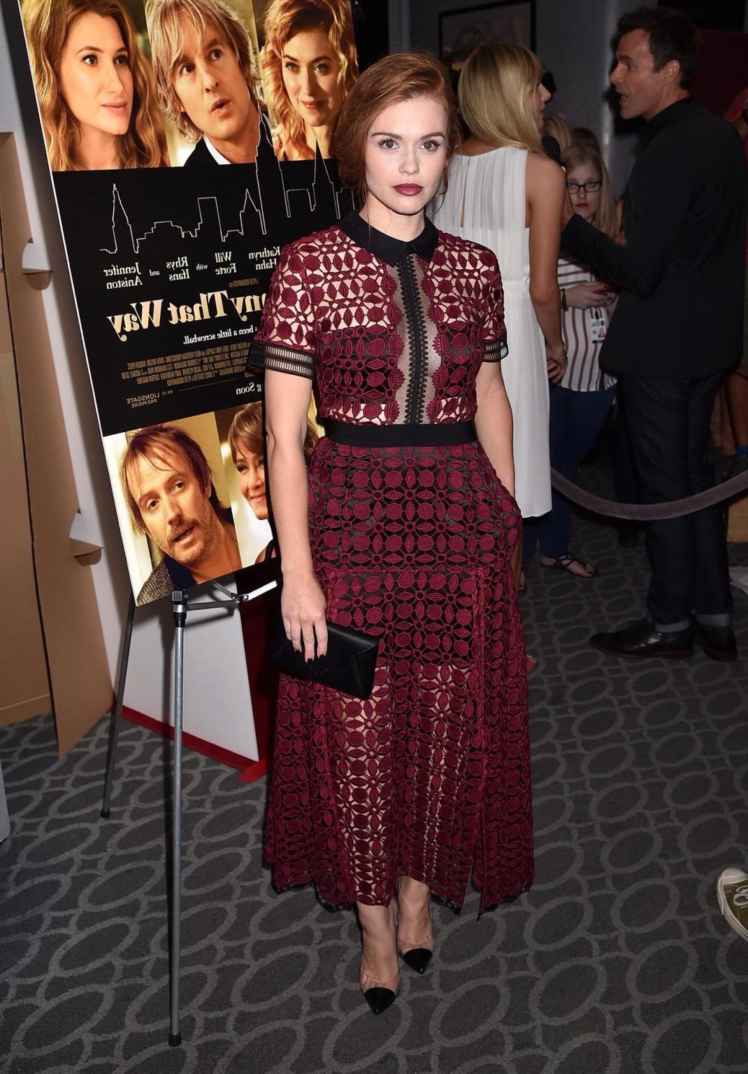 16P Holland Roden braless shows cleavage wearing a partially see thr