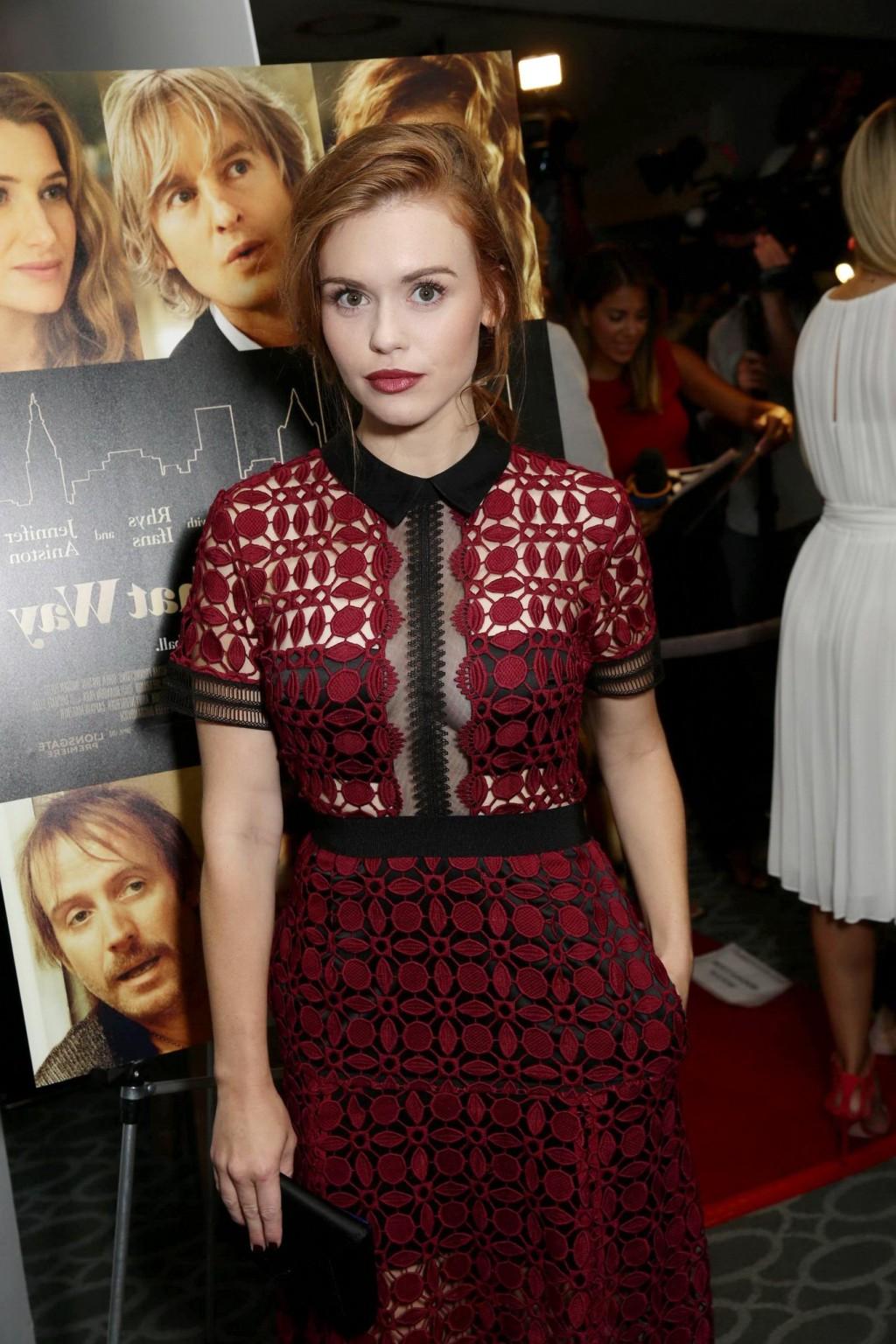 16P Holland Roden braless shows cleavage wearing a partially see thr