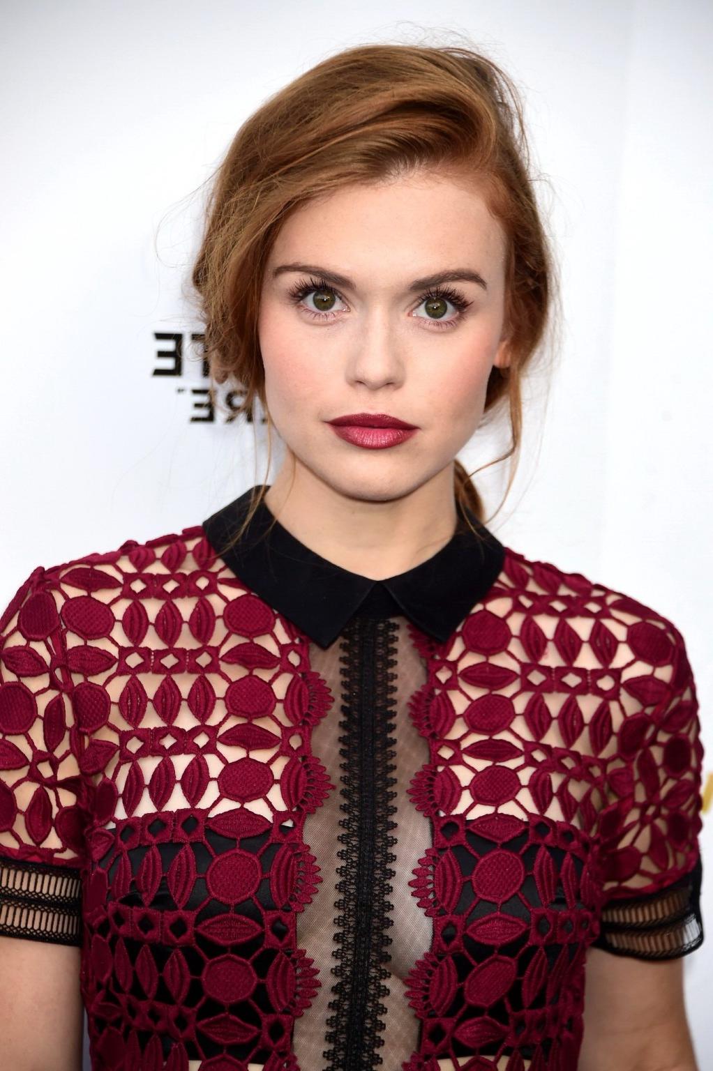 16P Holland Roden braless shows cleavage wearing a partially see thr
