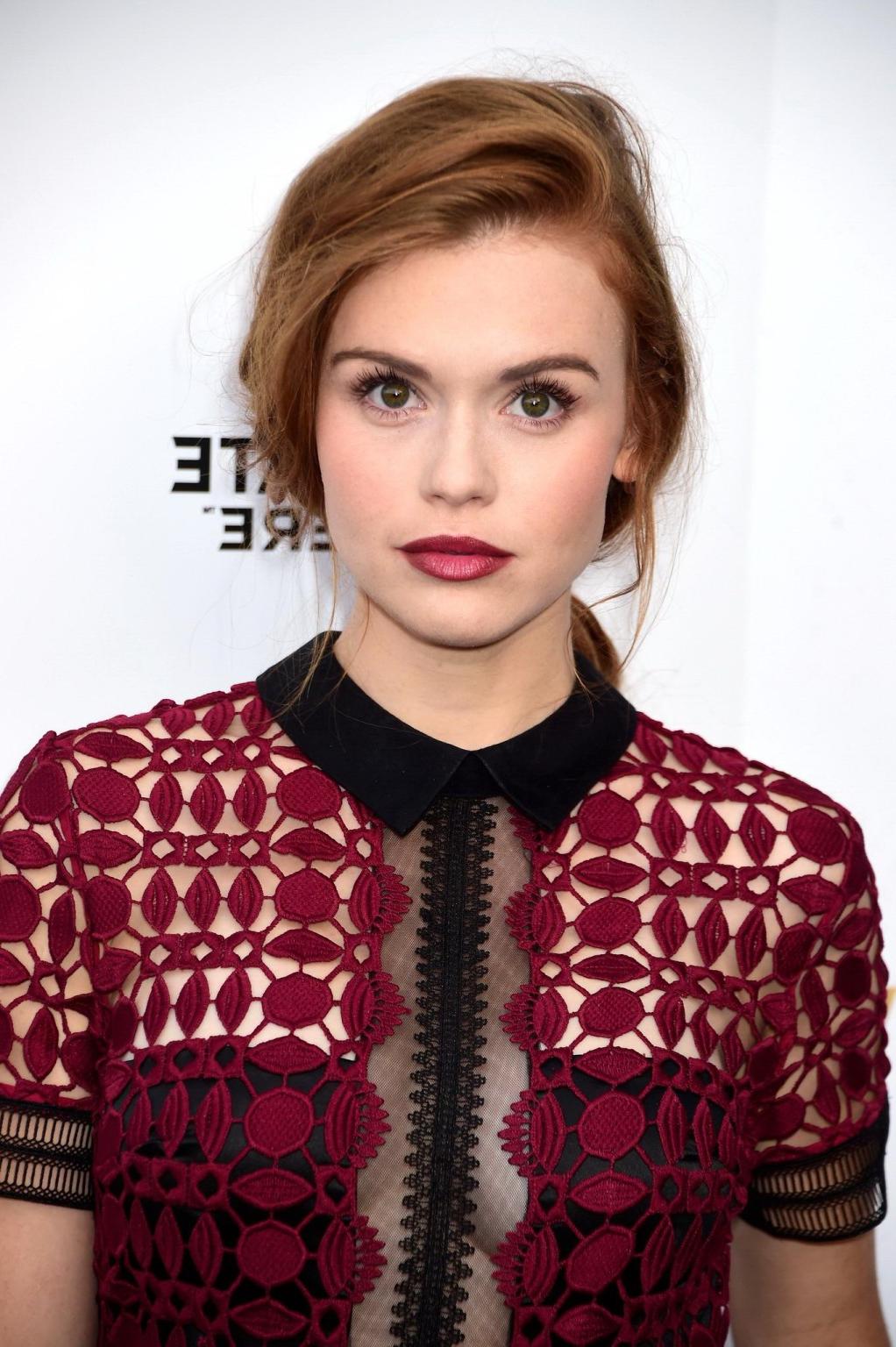 16P Holland Roden braless shows cleavage wearing a partially see thr