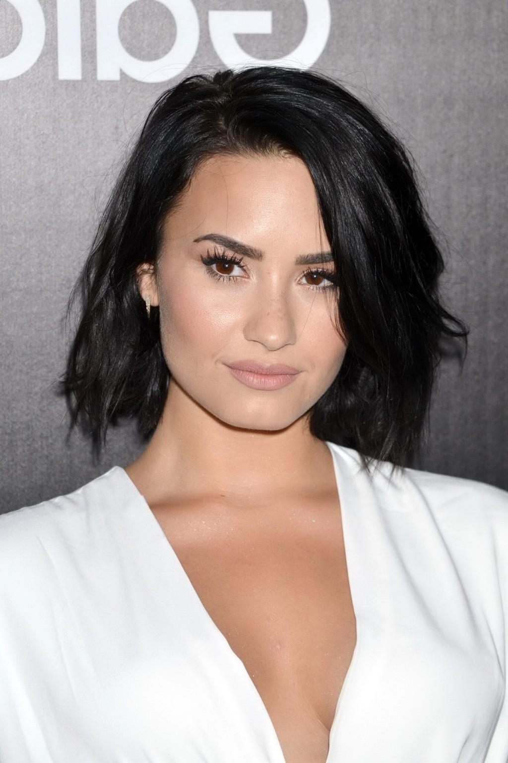 16P Demi Lovato showing huge cleavage at the party