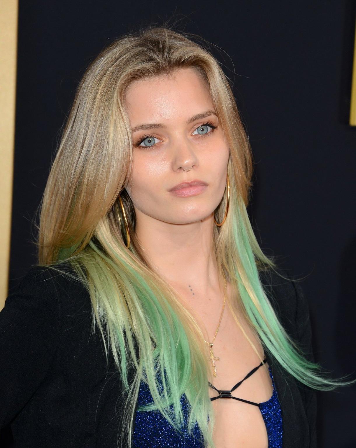 16P Abbey Lee Kershaw showing huge cleavage and leggy