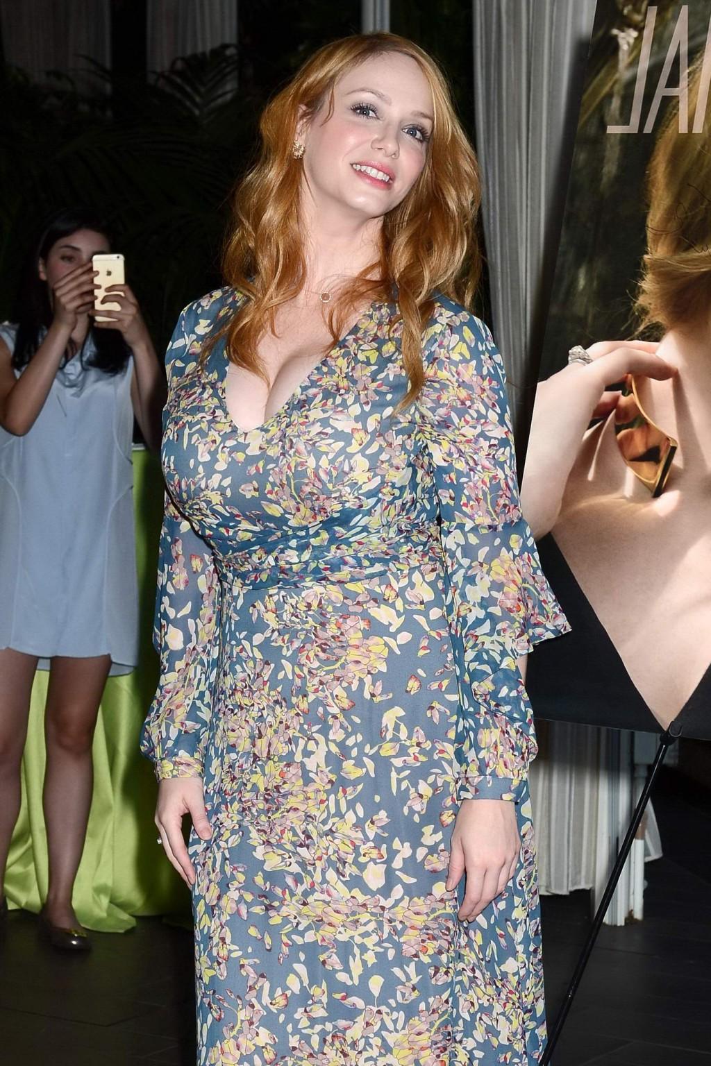 16P Busty Christina Hendricks showing huge cleavage
