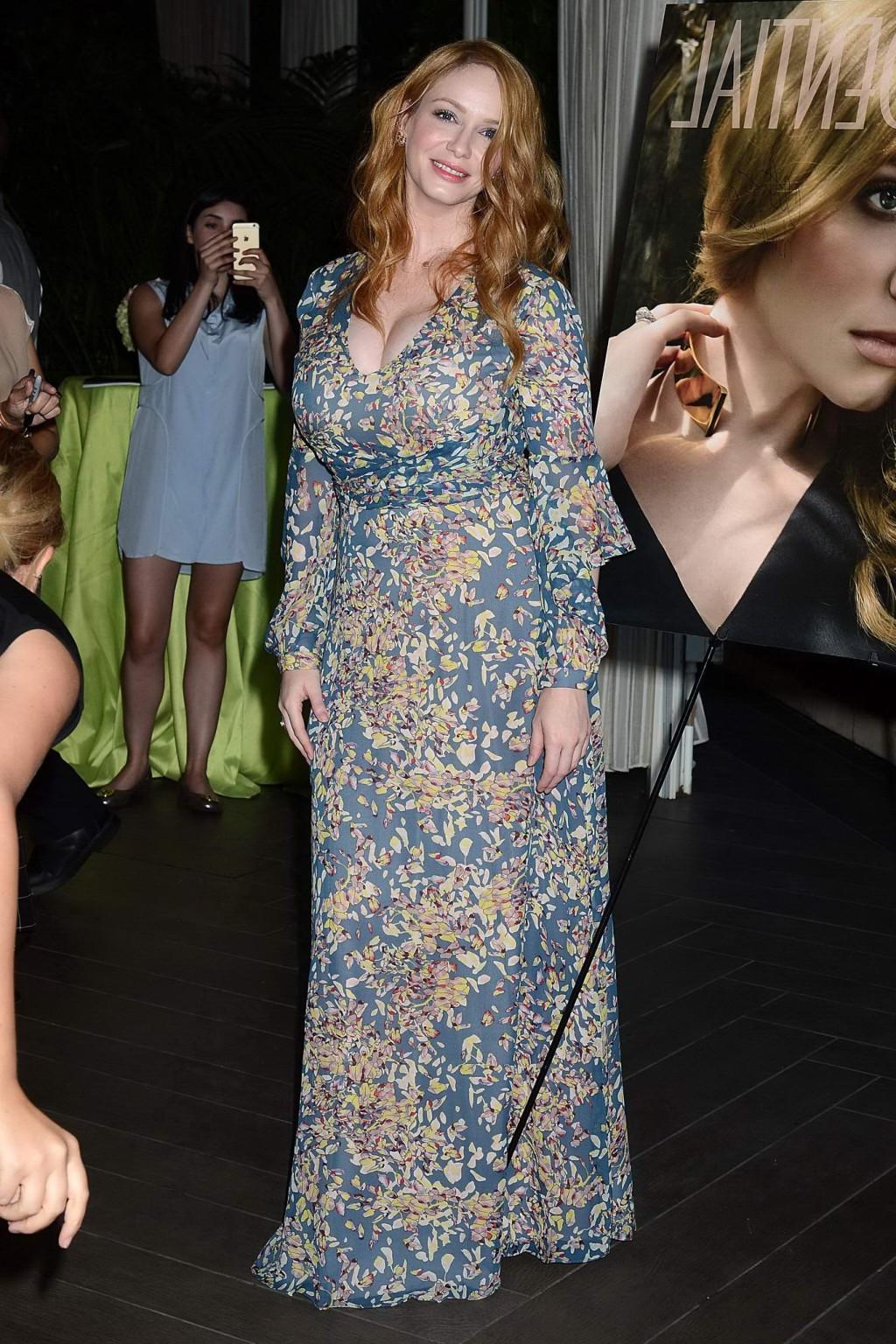 16P Busty Christina Hendricks showing huge cleavage