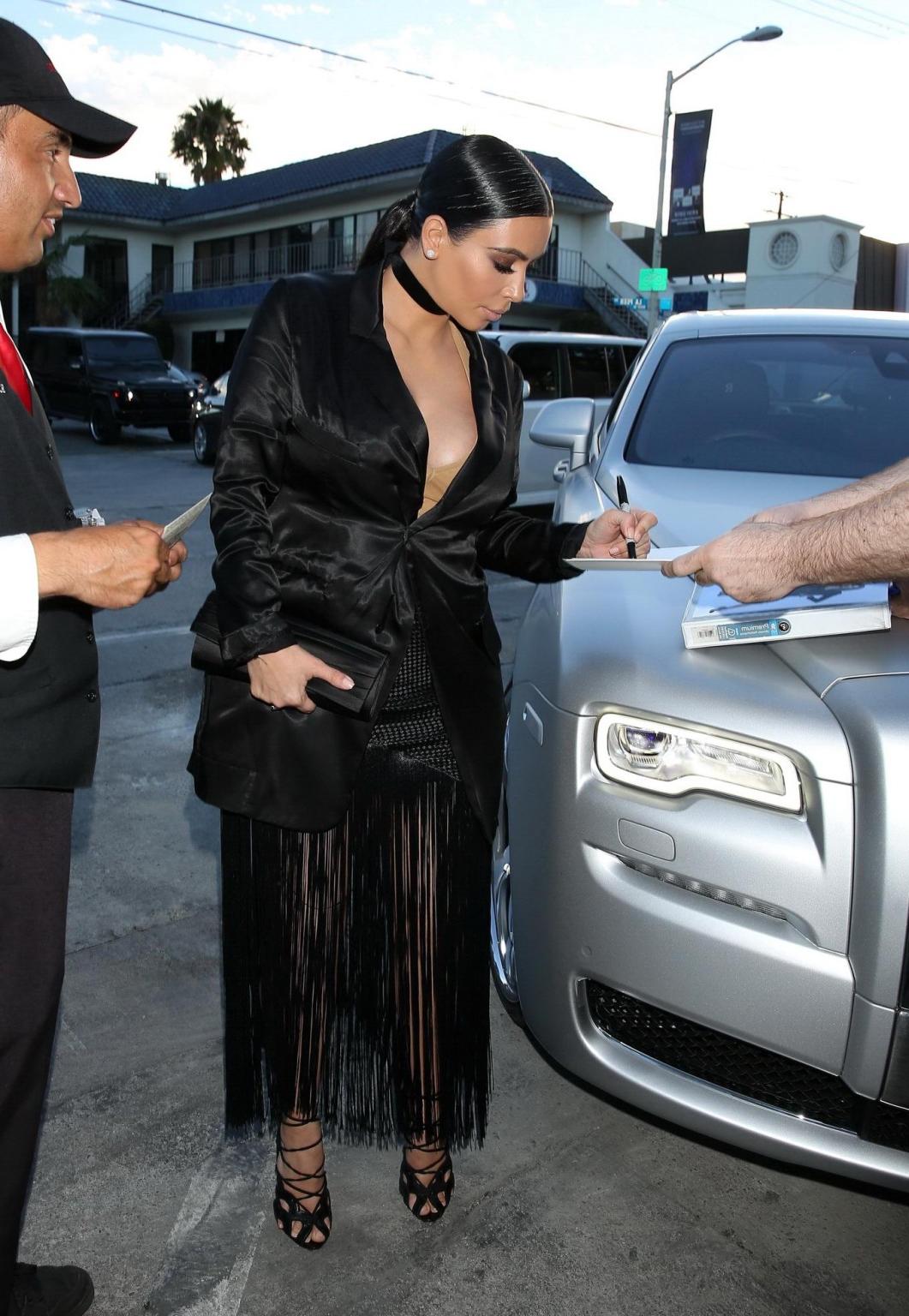 16P Kim Kardashian showing huge cleavage out in LA
