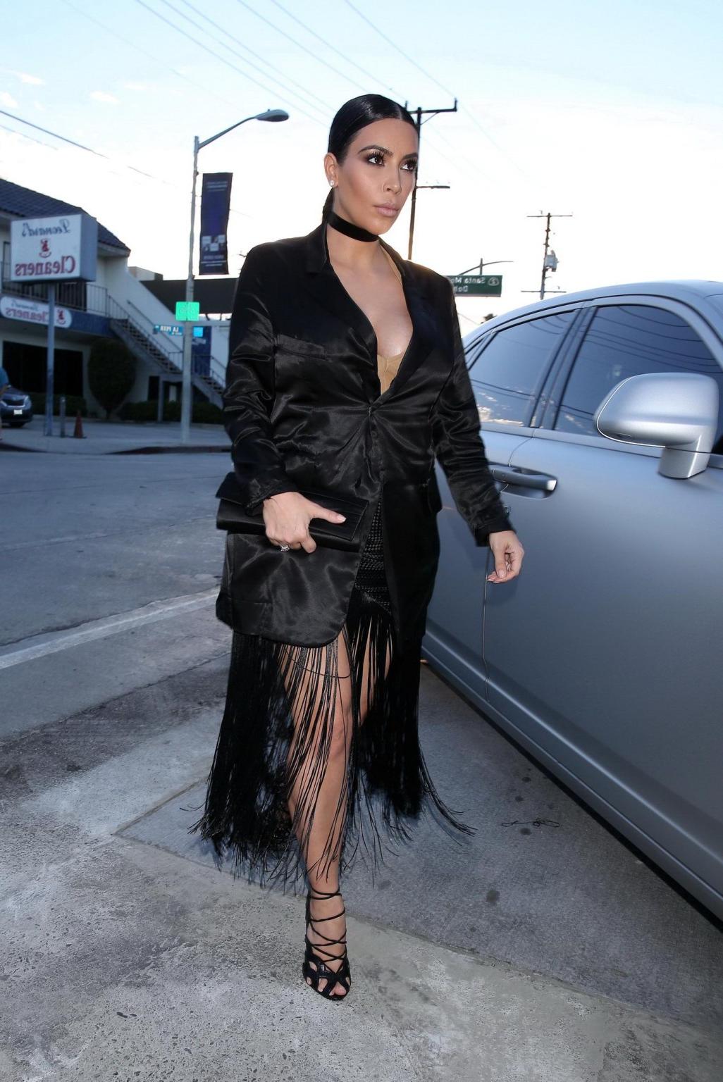 16P Kim Kardashian showing huge cleavage out in LA
