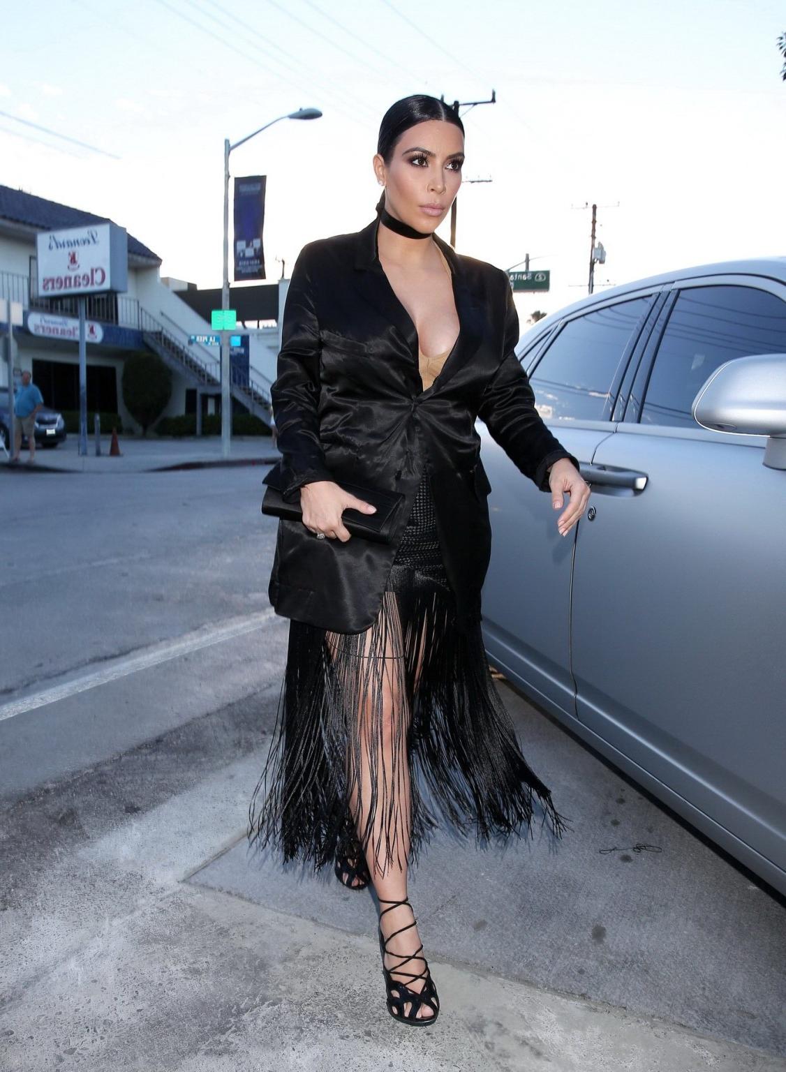 16P Kim Kardashian showing huge cleavage out in LA