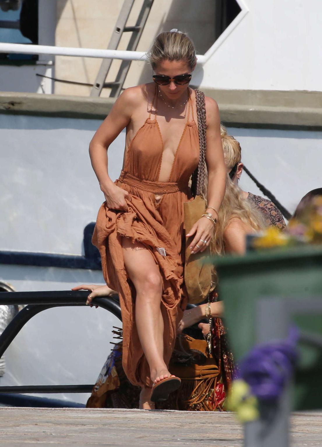 16P Elsa Pataky showing nipple pokies and sideboob in Corsica