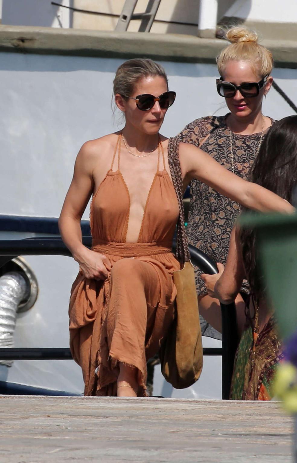 16P Elsa Pataky showing nipple pokies and sideboob in Corsica