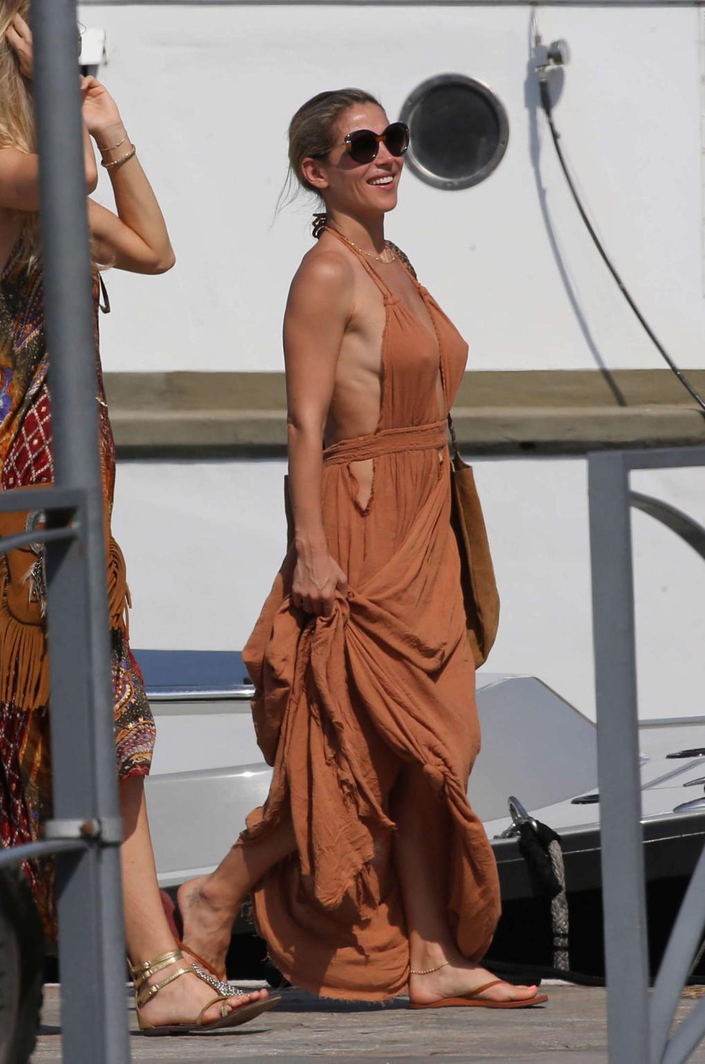 16P Elsa Pataky showing nipple pokies and sideboob in Corsica