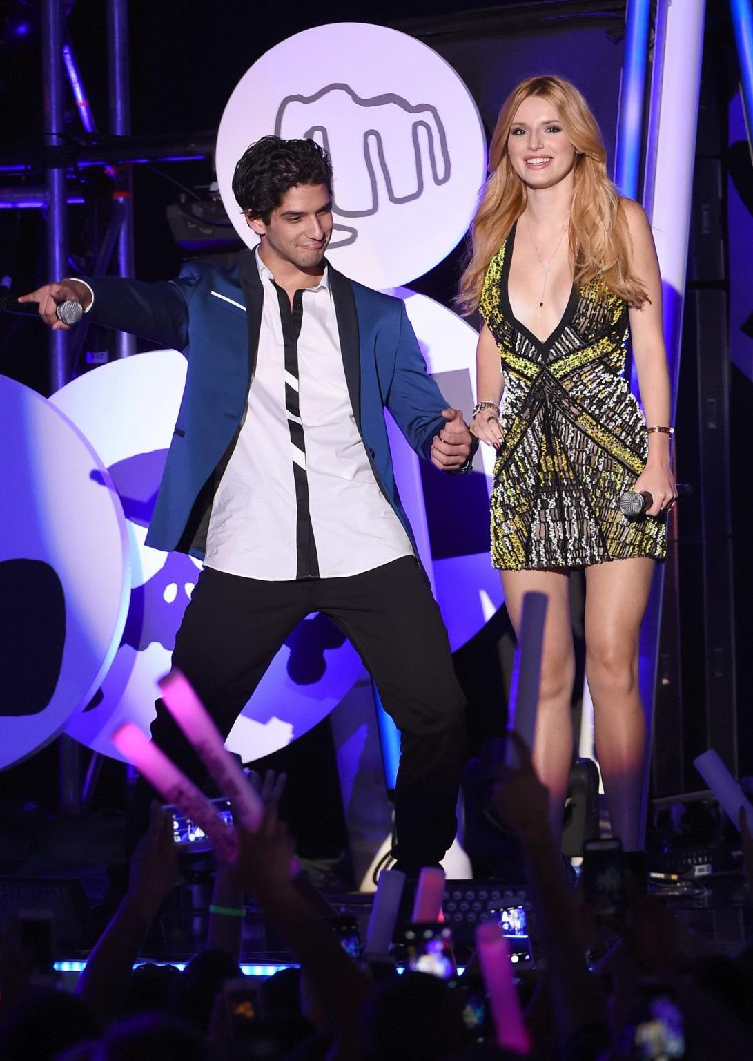 16P Bella Thorne leggy  showing huge cleavage