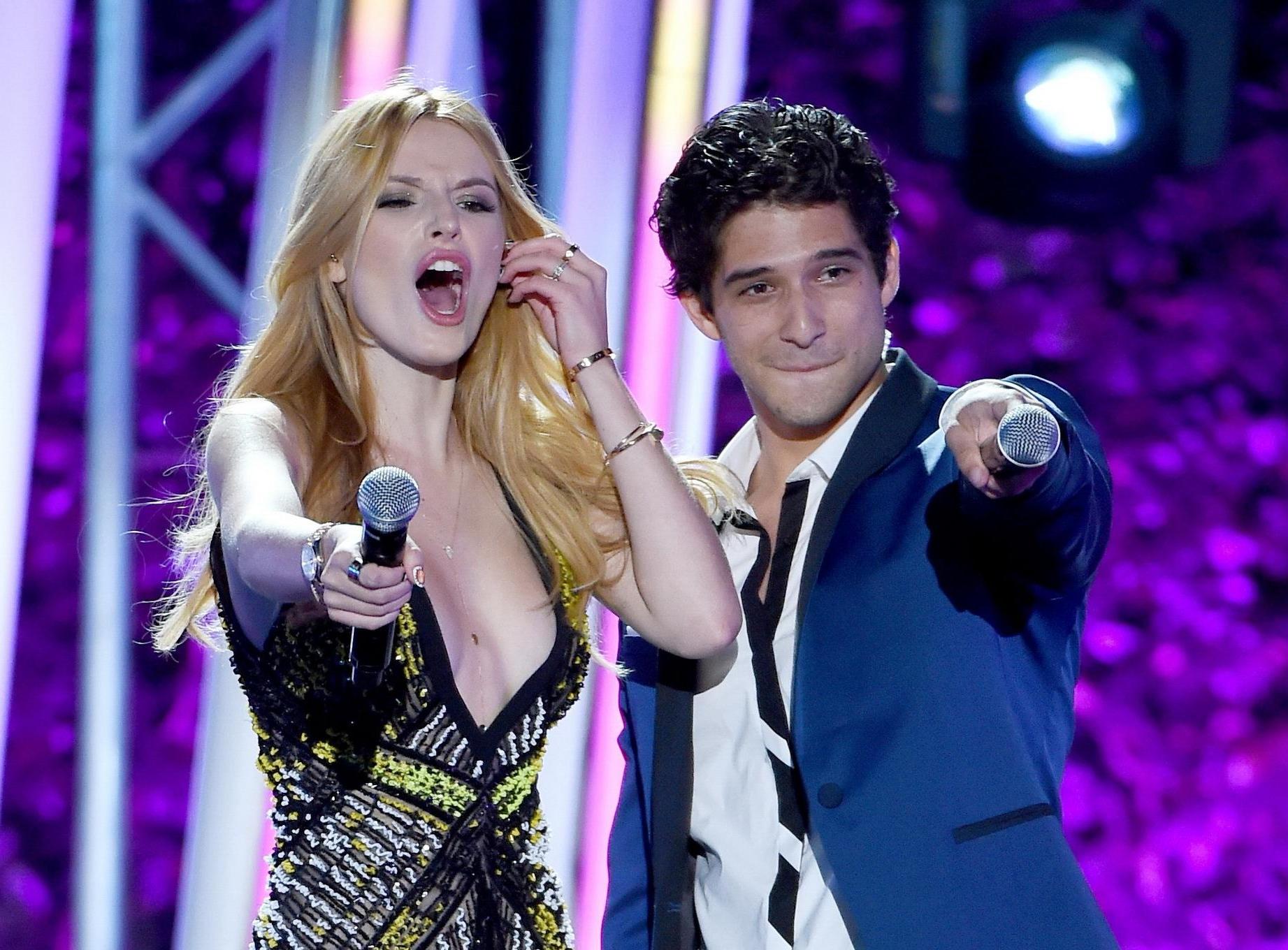 16P Bella Thorne leggy  showing huge cleavage