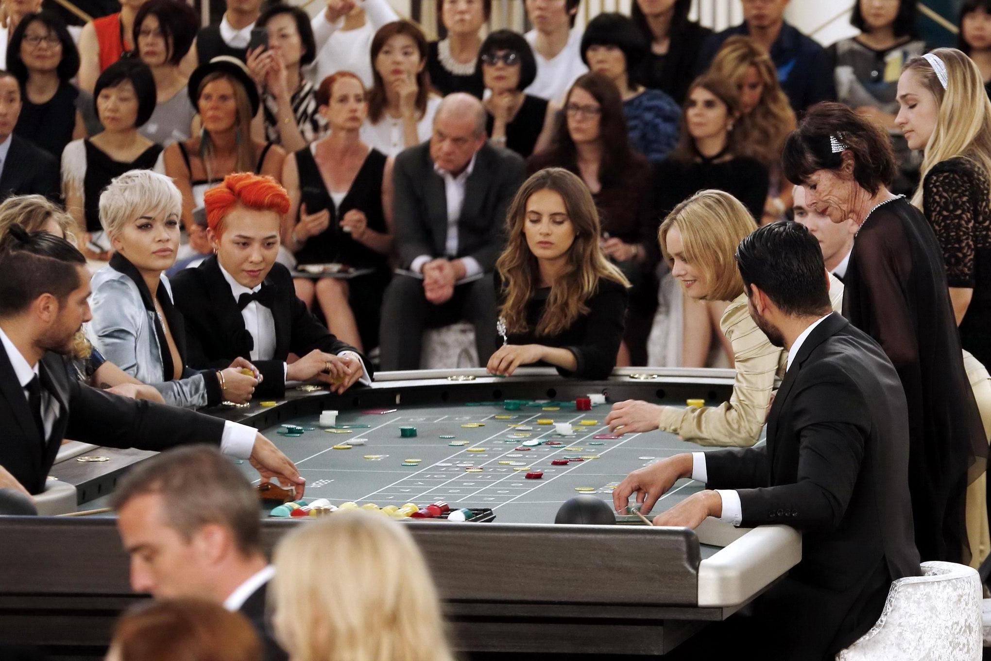 16P Rita Ora showing huge cleavage at the Chanel fashion show