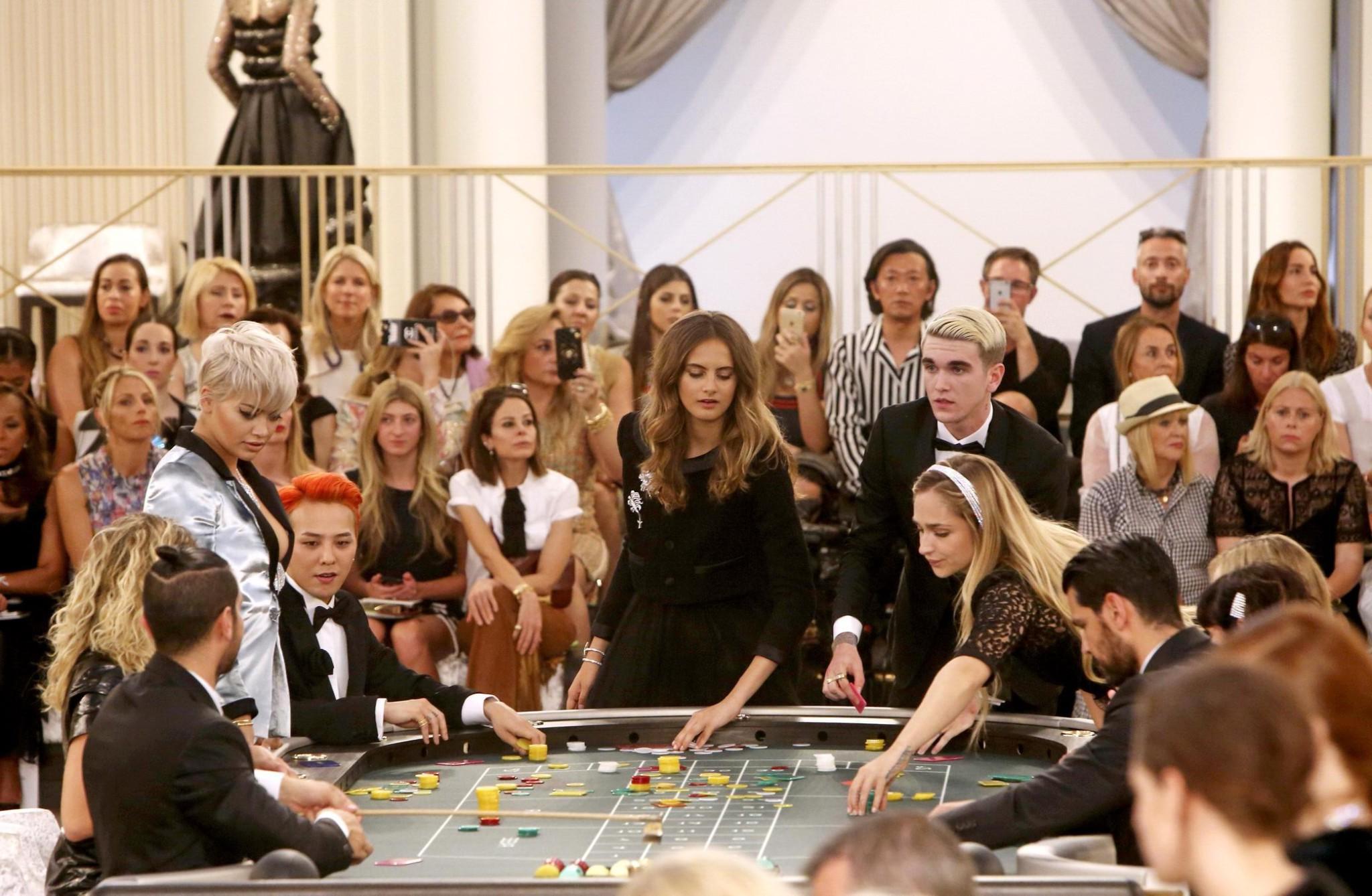 16P Rita Ora showing huge cleavage at the Chanel fashion show