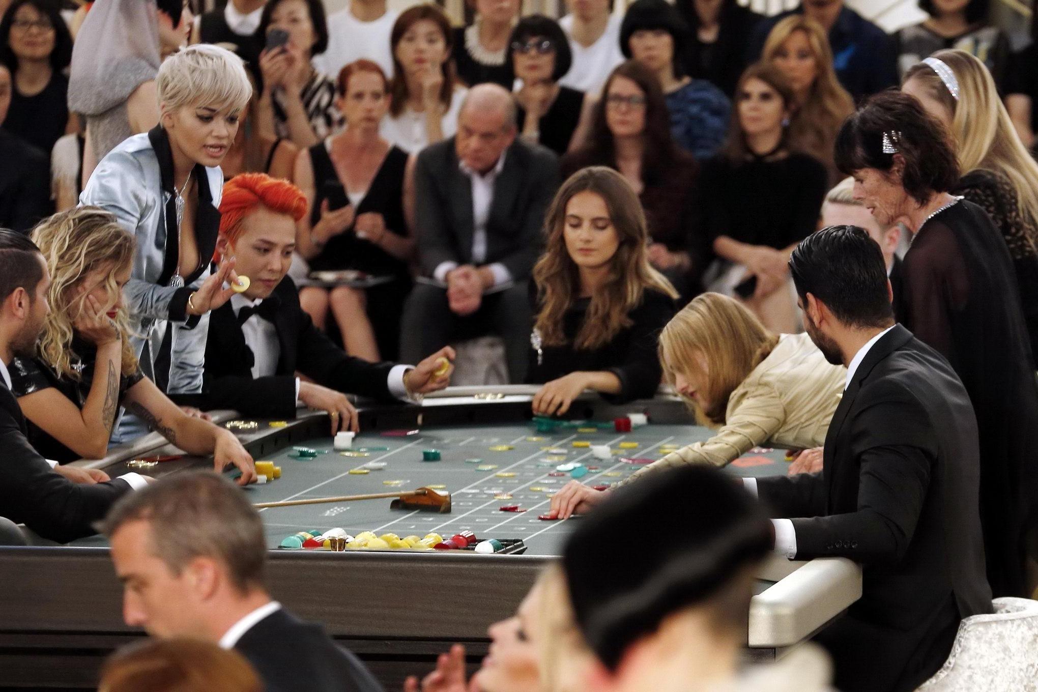 16P Rita Ora showing huge cleavage at the Chanel fashion show