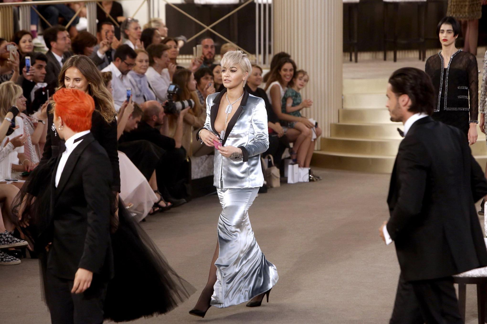 16P Rita Ora showing huge cleavage at the Chanel fashion show
