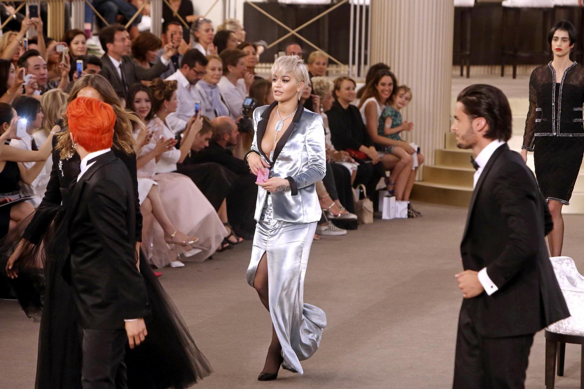 16P Rita Ora showing huge cleavage at the Chanel fashion show