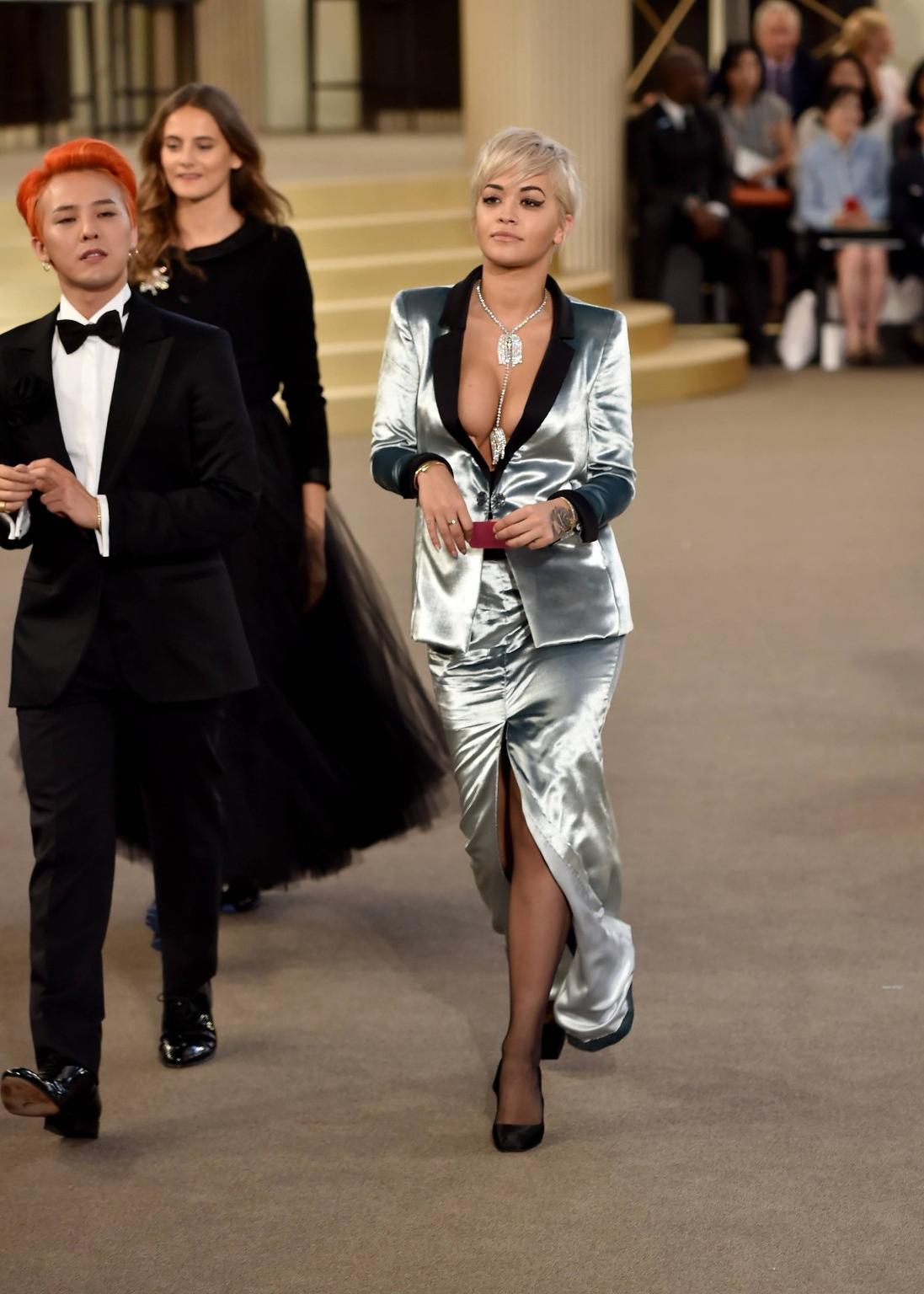 16P Rita Ora showing huge cleavage at the Chanel fashion show