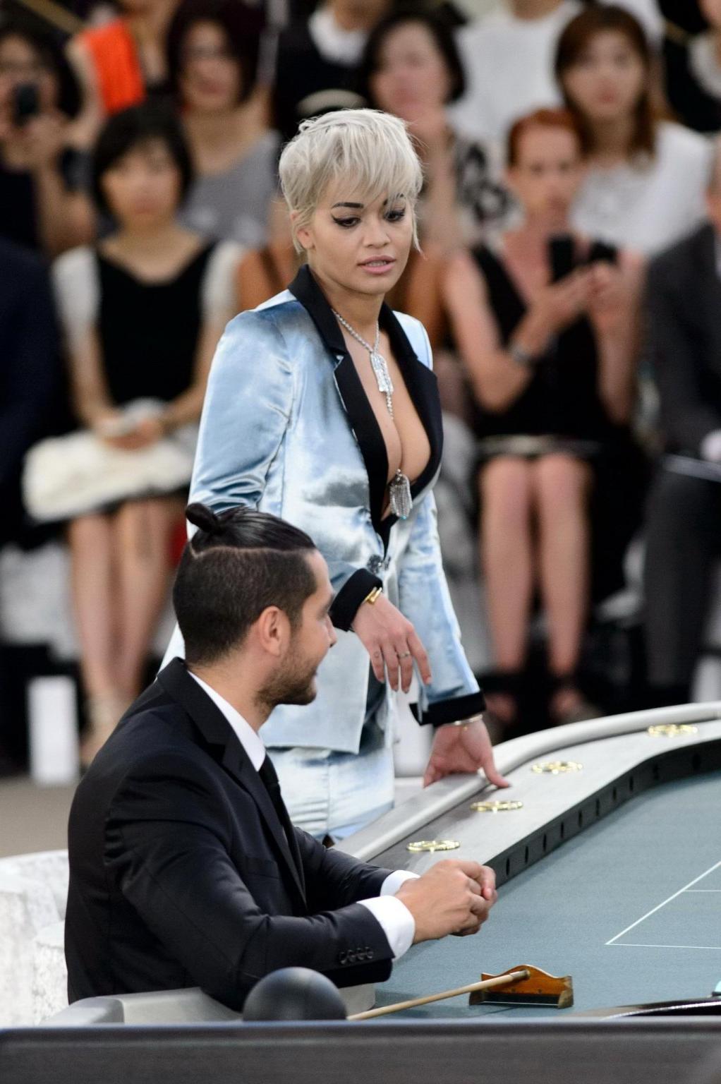 16P Rita Ora showing huge cleavage at the Chanel fashion show